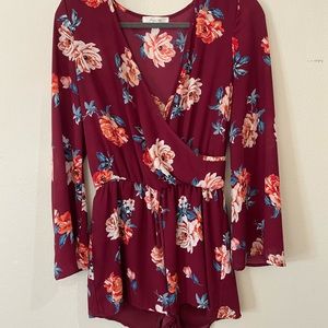 Red floral long sleeve romper